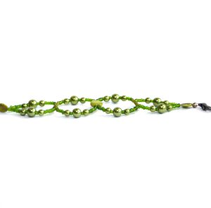 Barnarmband med gröna glaspärlor